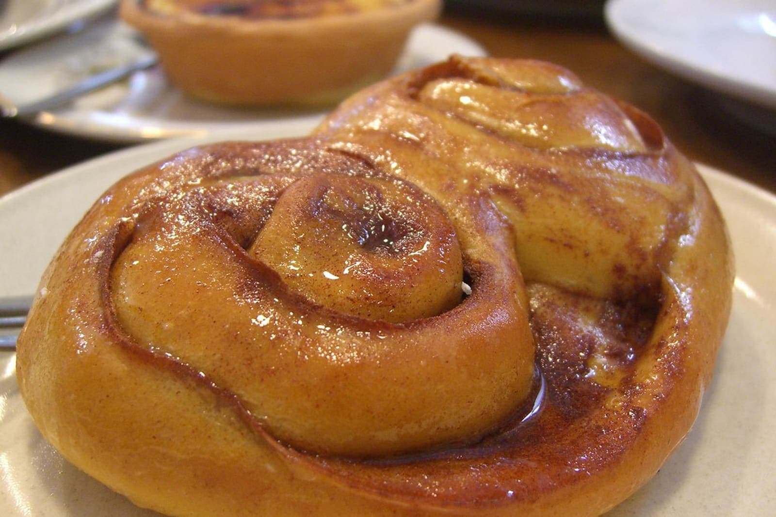 A glazed roll finished with a bright citrus glaze.