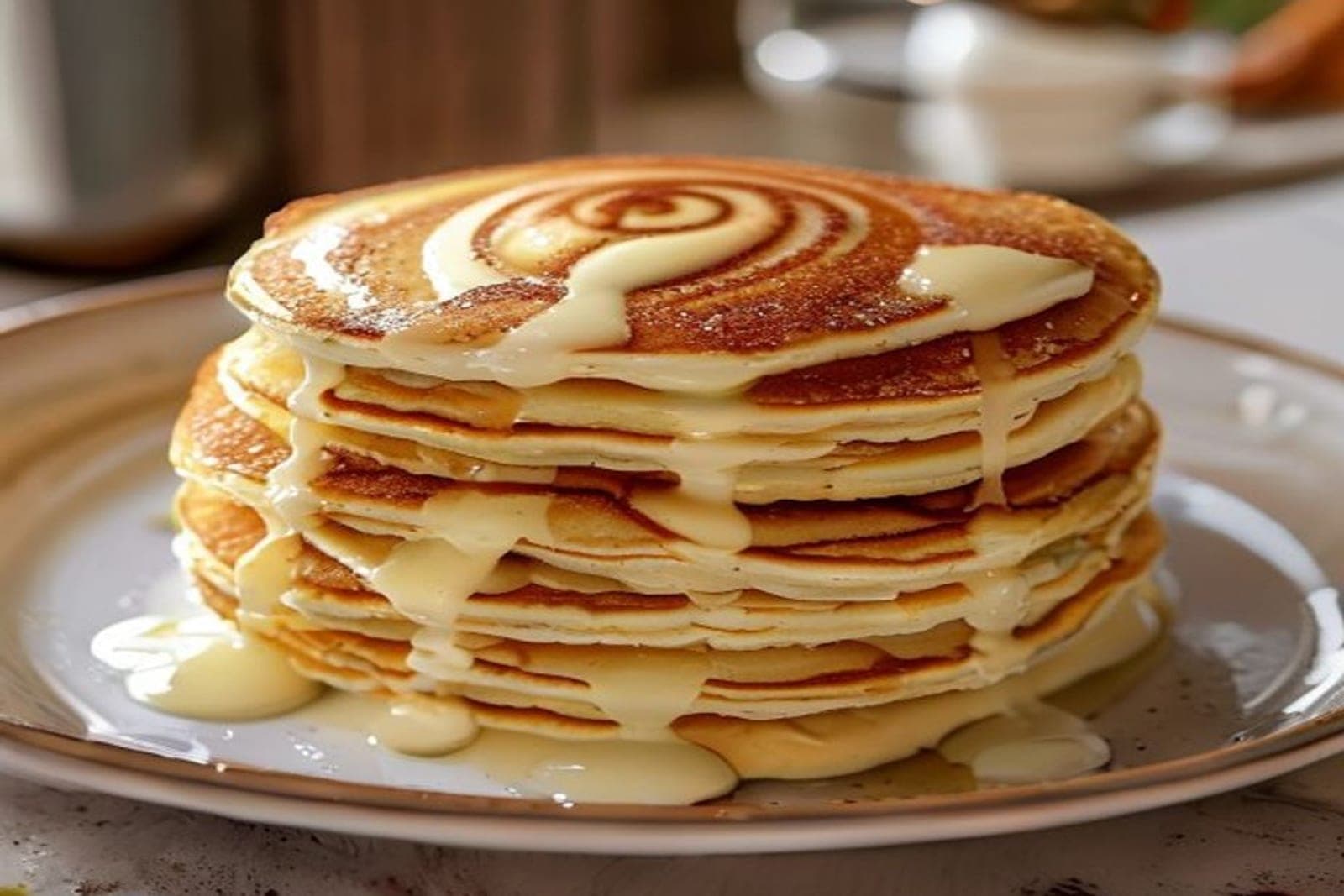 a stack of fluffy buttermilk pancakes with a visible cinnamon-sugar spiral swirled into the top pancake (AI-generated editorial image)