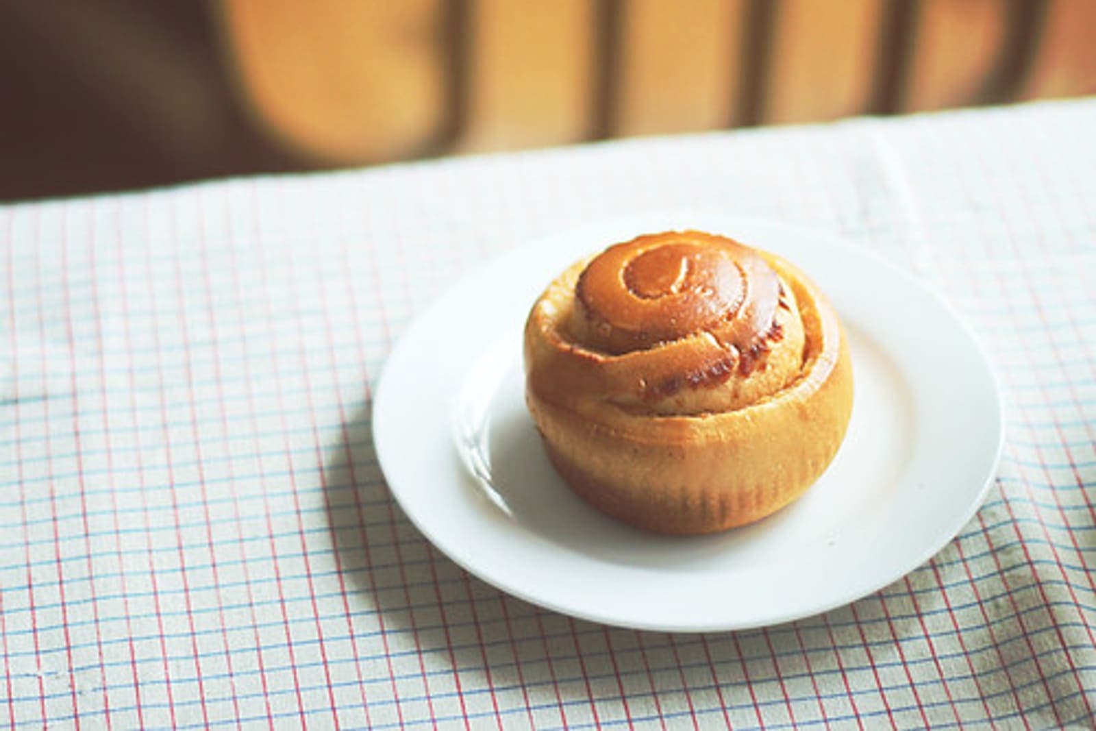 quick one hour cinnamon rolls with vanilla glaze in a baking dish (AI-generated editorial image)